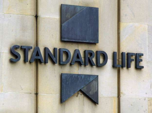 A sign on a wall that says standard life