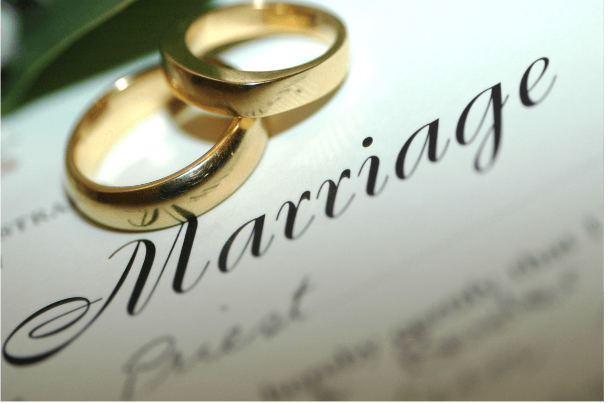 The word marriage is on a piece of paper