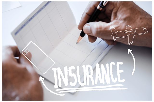 A person is writing on a piece of paper that says insurance